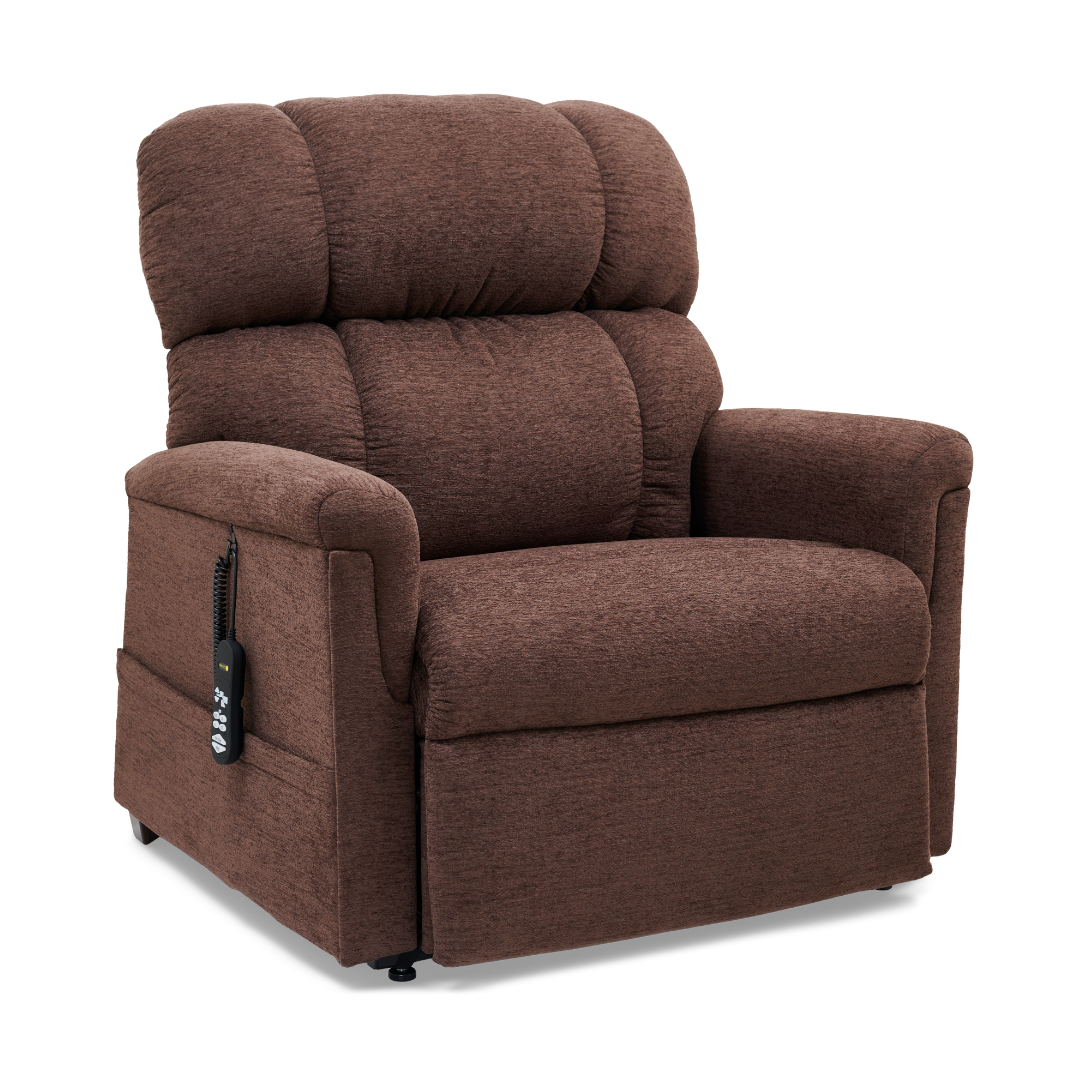 The Golden PR535 MaxiComfort Recliner, part of the Comforter Series, is designed for ergonomic support with plush cushions, a wired remote on its side, textured fabric covering, and MaxiComfort Positioning for unmatched comfort.