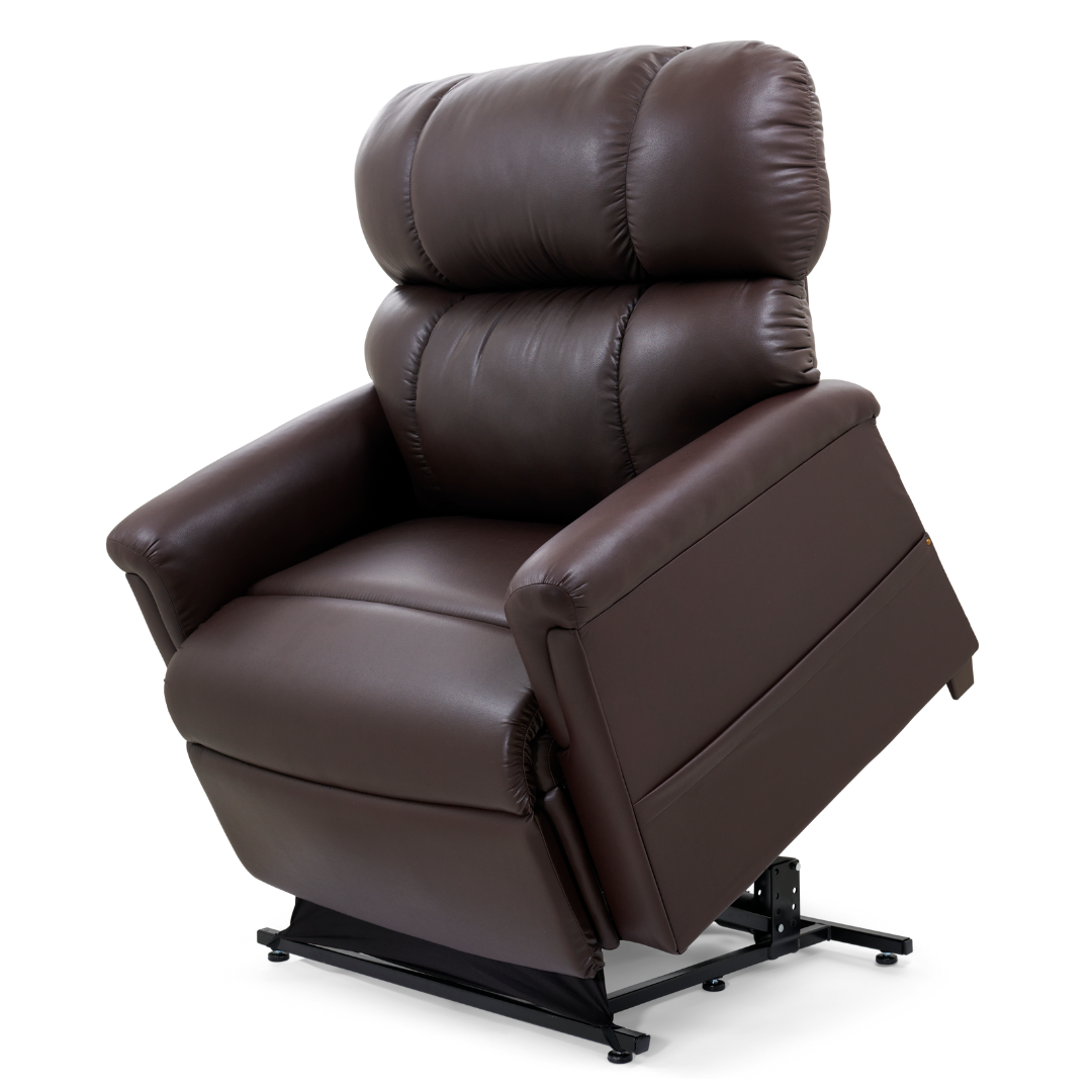 The Golden PR535 MaxiComfort Recliner w/ Lift Assist - Medium is a brown leather chair featuring padded armrests, a high backrest, ergonomic support, and a partially elevated position with visible lift mechanism for ultimate relaxation.