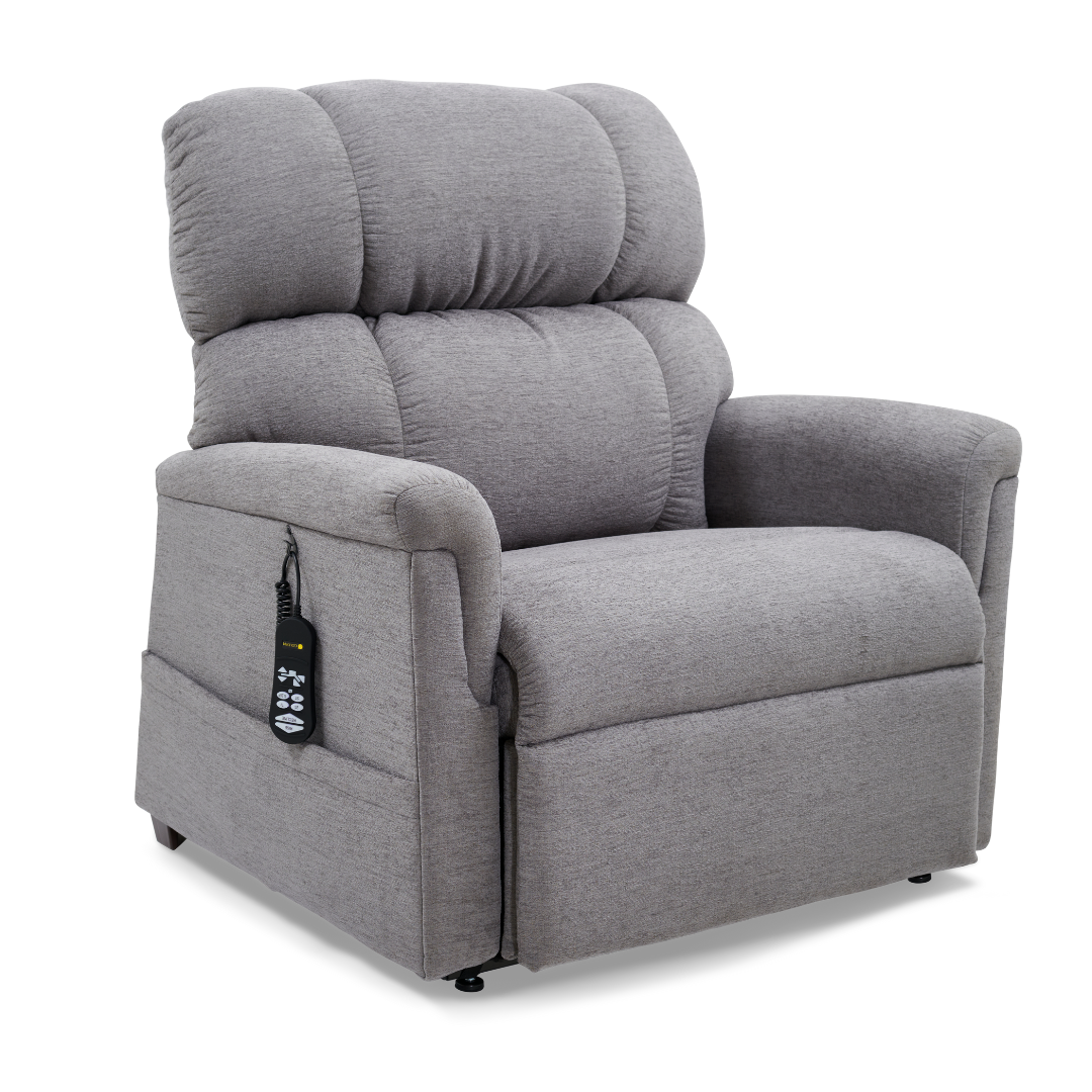 The Golden PR535 MaxiComfort Recliner with Lift Assist in medium size is a gray ergonomic armchair from the Comforter Series, featuring plush padding, a remote-controlled MaxiComfort positioning system, and a soft fabric finish that stands out against a white background.