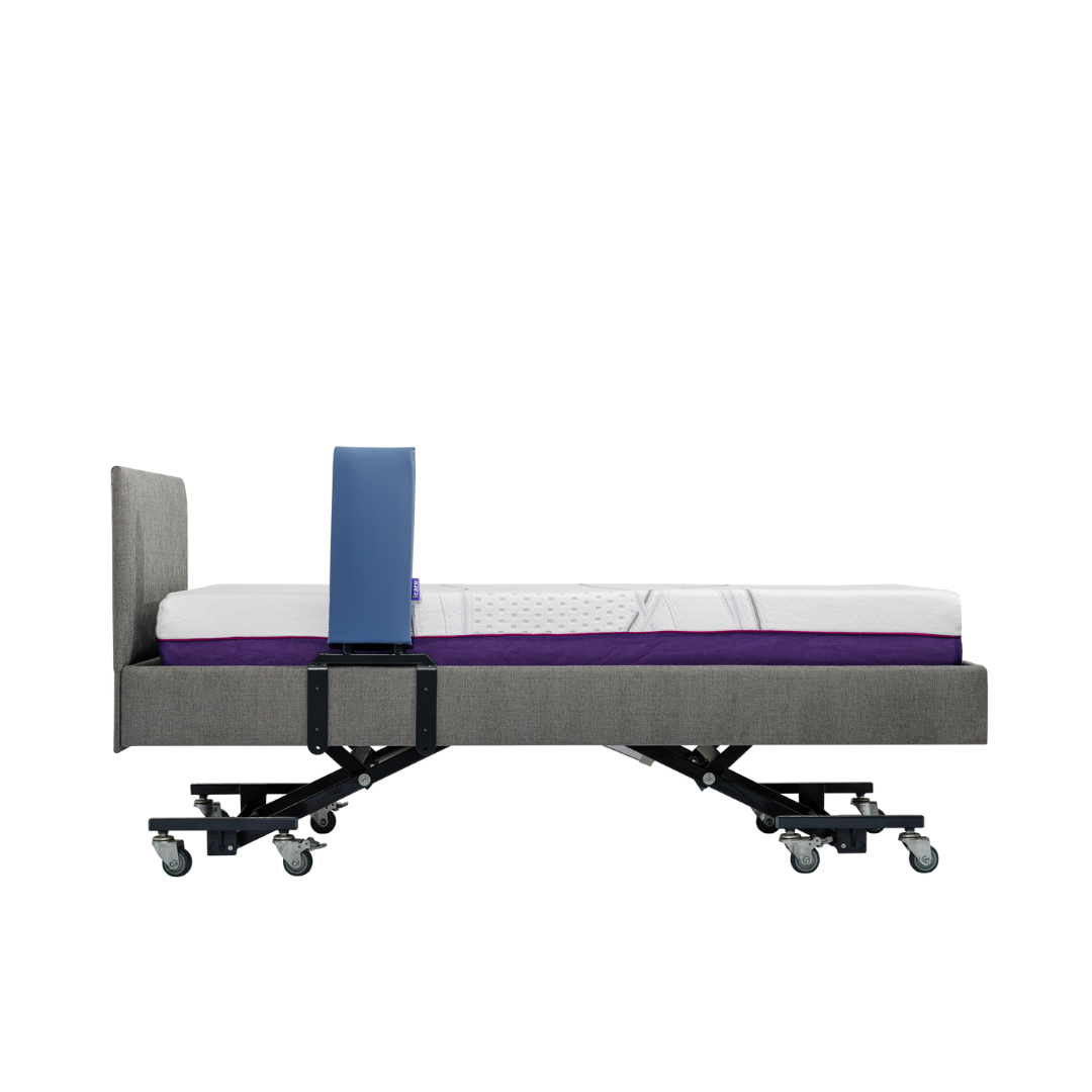 A modern adjustable hospital bed with wheels and a purple mattress features an iCare Medical Bed Safety Rail for support and fall prevention, along with a blue safety guard on the left, all on a white background.