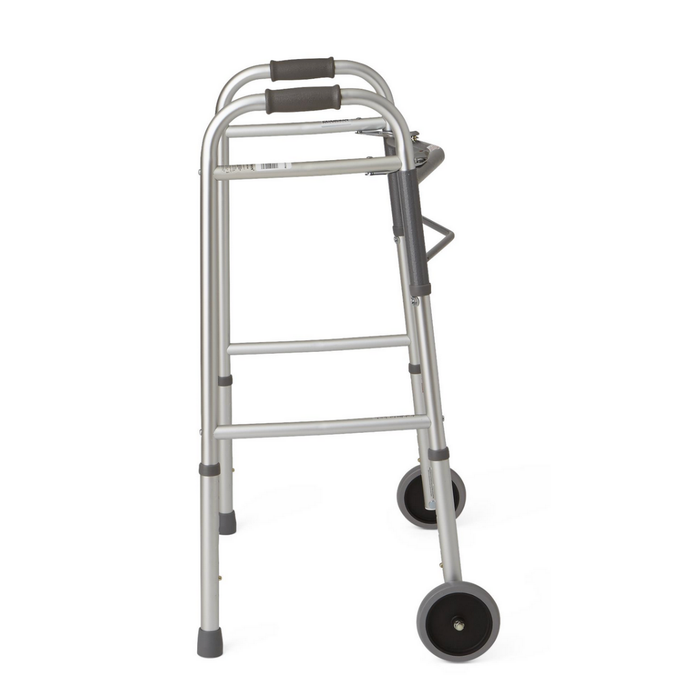 The Medline Guardian Two-Button Folding Walker features a lightweight aluminum frame, two front 5 wheels, rear legs without wheels, black foam handgrips, and side support bars.