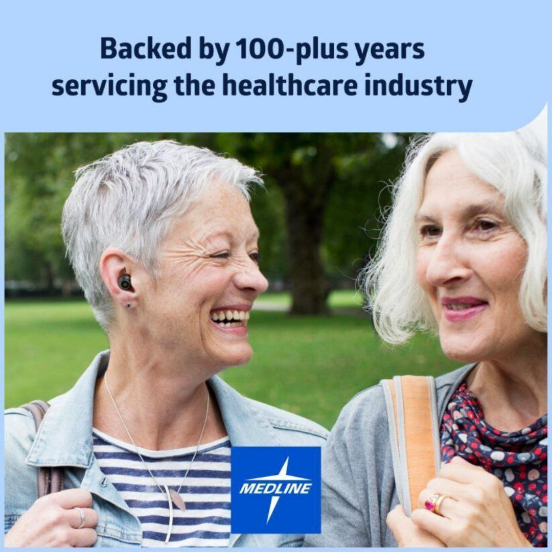 Two older women with short gray hair smile while walking outdoors. One enjoys noise reduction wearing the Medline Rechargeable Digital OTC Hearing Aid. Text above: Backed by 100+ years servicing healthcare. Medline logo at bottom.