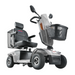 The Metro Mobility S500 Heavy Duty 4-Wheel Power Scooter in gray features a cushioned seat, backrest, armrests, front basket, side mirrors, and prominently displays model S-600 on the front.