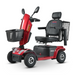 Introducing the Metro Mobility S500 Heavy Duty 4-Wheel Power Scooter in red, with a comfy black seat, armrests, steering handle, and handy front and rear storage baskets for your travel adventures.