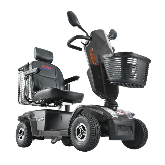 The Metro Mobility S500 is a heavy-duty 4-wheel power scooter in sleek black, featuring a front basket, adjustable seat with armrests and headrest, and rearview mirrors for added stability.