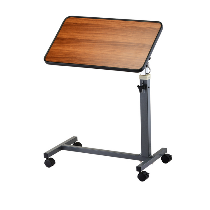 The Nova Medical Rolling Overbed Table features a woodgrain top, sleek black metal frame, adjustable tilting tabletop, and a base with locking swivel casters for easy movement.