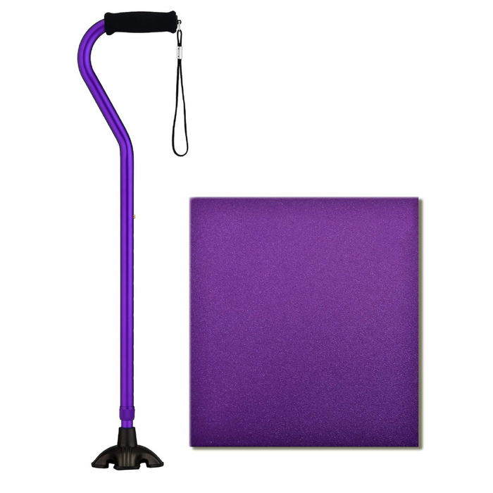 The Nova Medical Stand Alone SugarCane, featuring a Quad Tip for enhanced balance and stability, has a comfortable grip and strap for support. It stands beside a square block, both in purple.