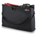 The Nova Extra-Large Carry & Travel Bag for Rollator Walkers & Transport Chairs, in black with a shoulder strap, is shown partially open to display a folded red walker inside. The colorful nova logo appears on the upper right corner.