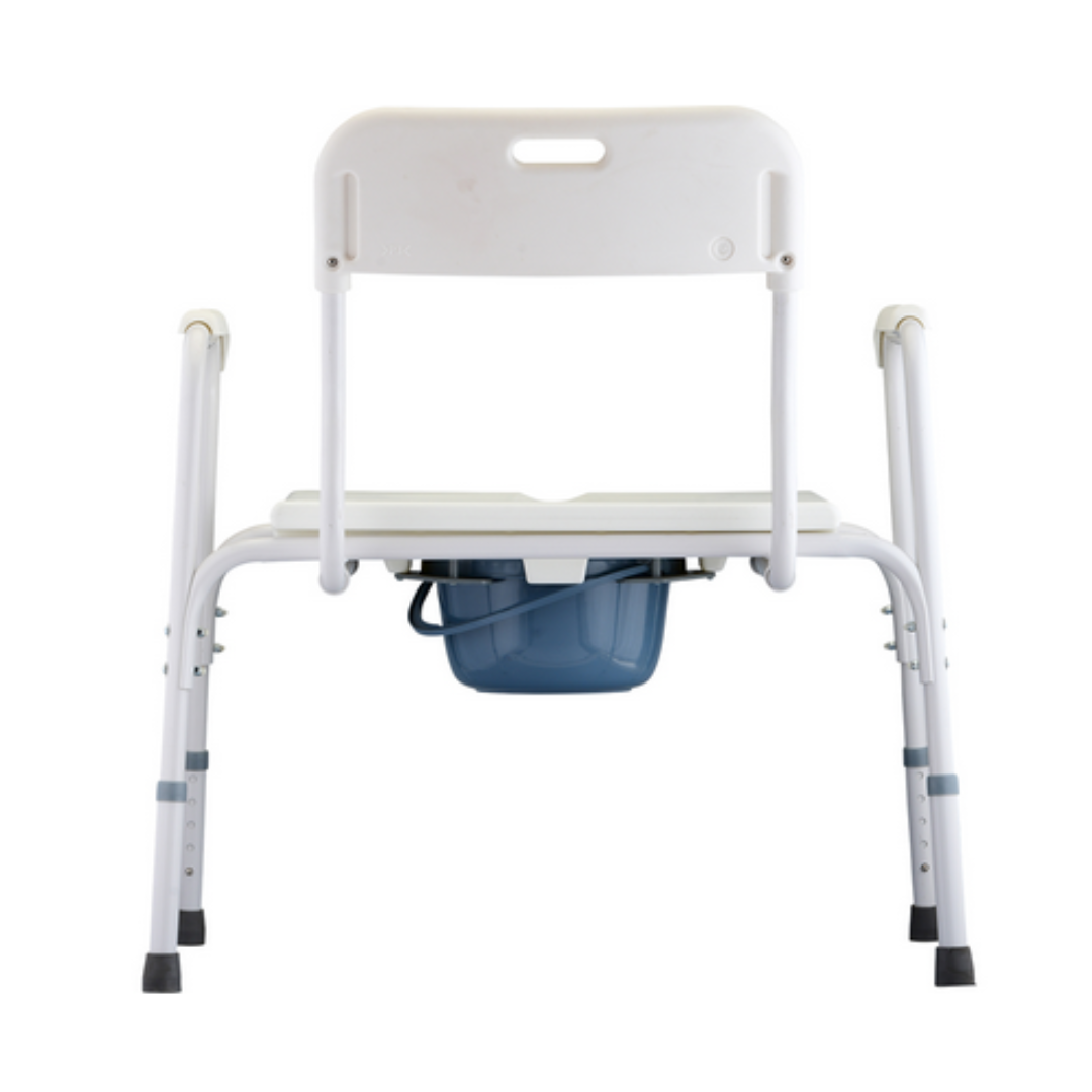 The Nova Heavy Duty Bedside Commode, adjustable and versatile with a white seat and backrest, includes a removable blue basin. Its four rubber-tipped legs ensure stability, perfect for personal care settings. The Drop Arm Commode design allows easy lateral transfers.