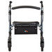 A front view of the Nova Medical Star 8 DX Heavy Duty Extra-Wide Bariatric Rollator shows a black and silver design with all-terrain wheels, padded seat, and storage pouch with colorful nova letters, combining comfort with sturdy modern style.