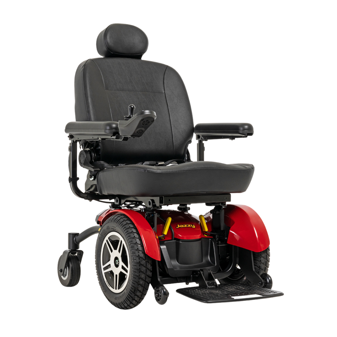 The Pride Mobility Jazzy® Elite 14 Powerchair, in red and black, features large rear wheels, a padded seat and backrest, adjustable armrests, footrest, headrest, and right-arm joystick control.