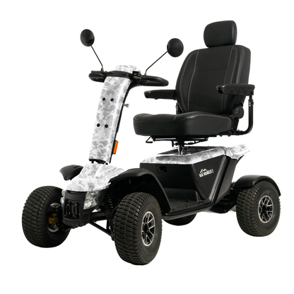 The Pride Baja® Wrangler® 2 Heavy Duty Outdoor Scooter features four large all-terrain tires, a cushioned seat with armrests and headrest, rearview mirrors, and camouflage-patterned front and side covers for outdoor use.