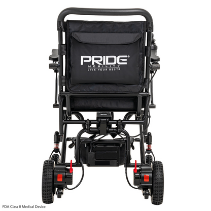 A rear view of the black Pride Mobility Jazzy® Carbon Ultralite Powerchair shows PRIDE on the backrest. It features red suspension springs, rugged wheels for comfort, and a removable joystick with USB charging for convenience.
