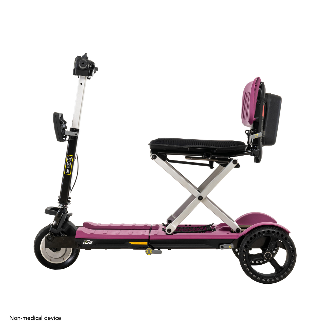 The Pride Mobility i-Go™ Portable Travel Scooter features an ultra-compact side profile with a purple frame, black seat with backrest, three wheels, adjustable handlebar, and feather-touch disassembly for seamless transport and storage.