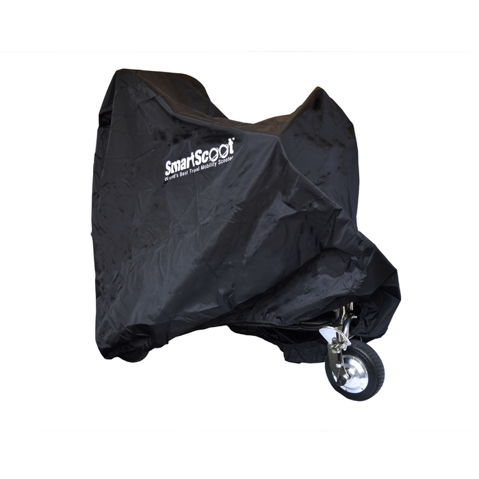 The SmartScoot® Ultra Light Mobility Scooter, equipped with a black protective tarp branded SmartScoot, showcases its sleek design as the front wheel glimmers. Its FAA approved for seamless travel and includes a comprehensive travel warranty for peace of mind.