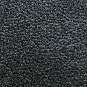 A close-up of a textured, dark grayish surface with fine wrinkles and a subtle sheen resembles the luxurious finish on the Golden Tech PR510 MaxiComfort Cloud Recliner with Lift Assist - Extra Wide.