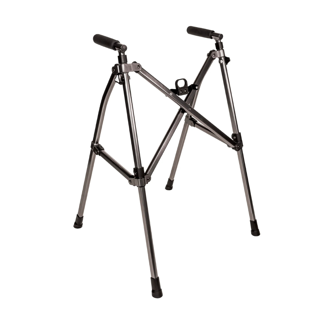 The Stander Wonder Walker Lite is a compact folding walker with four metal legs, black rubber tips, and padded hand grips, designed for lightweight and reliable mobility support.