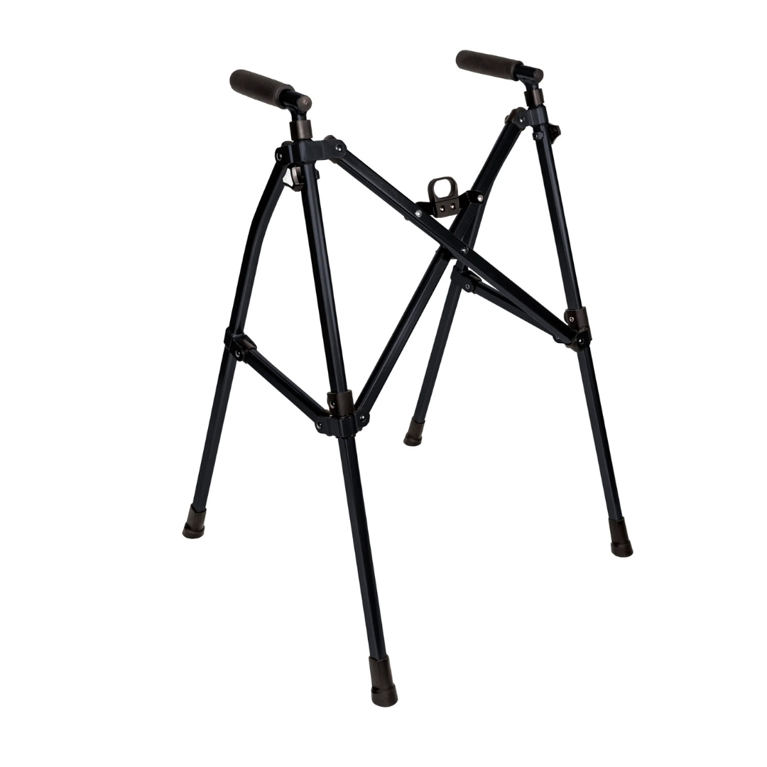 The Stander Wonder Walker Lite, shown on a white background, is a black, foldable walker with four legs and rubber feet, featuring a compact folding design for easy support and portability.