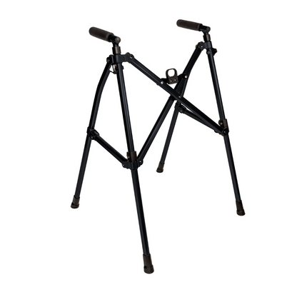 The Stander Wonder Walker Lite, shown on a white background, is a black, foldable walker with four legs and rubber feet, featuring a compact folding design for easy support and portability.