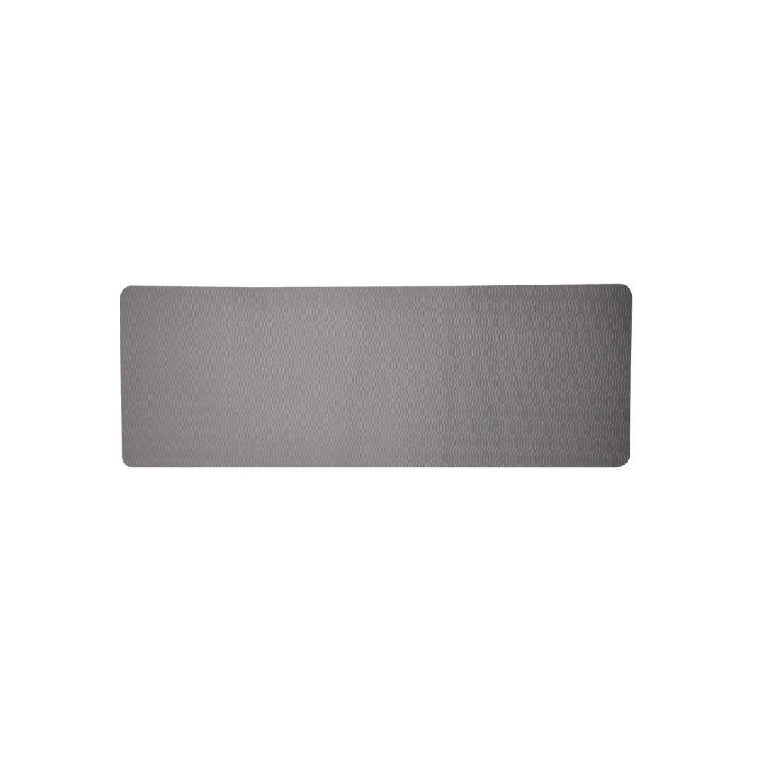 A gray Step2bed Deluxe Bedside Step-Up Platform with Accessory kit is displayed flat on a white background, resembling the cushioned surface of a yoga mat.