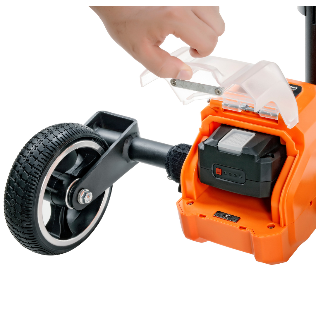 A hand inserts a battery into the SuperHandy Passport Power Mobility 3-Wheel Scooter, an orange gardening tool resembling a lightweight mobility scooter with a black wheel and transparent cover.