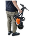 Man holding the SuperHandy Passport Power Mobility 3-Wheel Scooter - Only 35 lbs GUT112