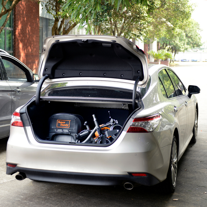 The SuperHandy Passport Power Mobility 3-Wheel Scooter in a car trunk