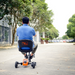 man riding the SuperHandy Passport Power Mobility 3-Wheel Scooter