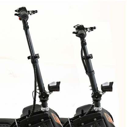 Close-up of SuperHandy Explorer Mobility Scooter handlebars with textured grips, digital display, and brake levers. Each stem, featuring a coil design, has a headlight. These scooters have durable pneumatic wheels and a powerful 500W motor against a white background.