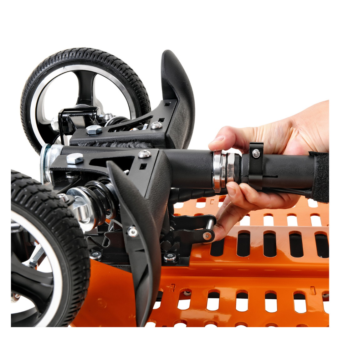 A close-up of a hand adjusting the black handle of an orange SuperHandy Passport Pro Mobility Scooter – Foldable & Ultralite, featuring two small black wheels, a grated platform, and metal components.