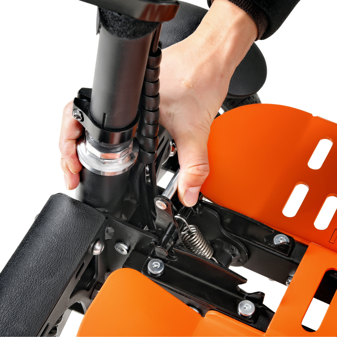 A person uses an Allen wrench to adjust the SuperHandy Passport Pro Mobility Scooters components. The hand grips the base, showing mechanism and screw details, highlighting its portable design with an orange and black color scheme.