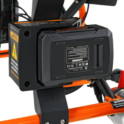 Close-up of a SuperHandy GoRide 2 Portable Electric Wheelchair battery, featuring warning labels and ergonomic controls on an orange frame against a white background, highlighting its intricate details.
