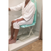 man in the shower sitting on the SuperHandy GoRise LT Portable Waterproof Floor Lift