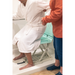 Man getting assistance from caregiver in the shower using the SuperHandy GoRise LT Portable Waterproof Floor Lift