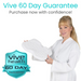 A woman in a white robe smiles holding a contoured orthopedic pillow. The image shows a teal Vive 60 Day Guarantee badge with the text Purchase now with confidence! referencing the Vive Health Shower Seat EVA Foam Cushion - Slip Resistant.