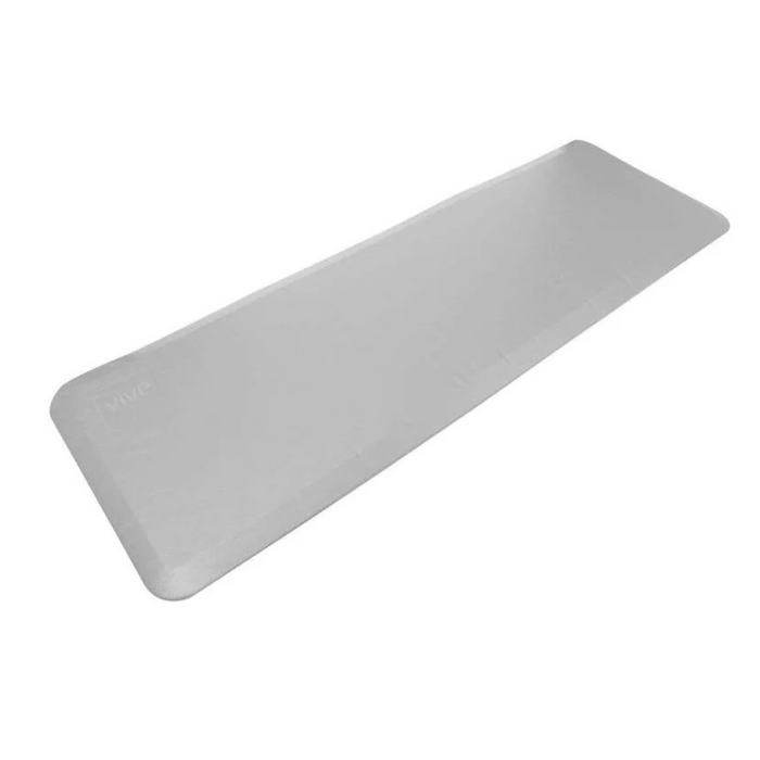 A rectangular light gray padded mat with slightly rounded corners, laid flat against a plain white background. The non-slip design ensures stability, featuring VIVE embossed in the corner, ideal for reducing injury risk for those with mobility challenges.