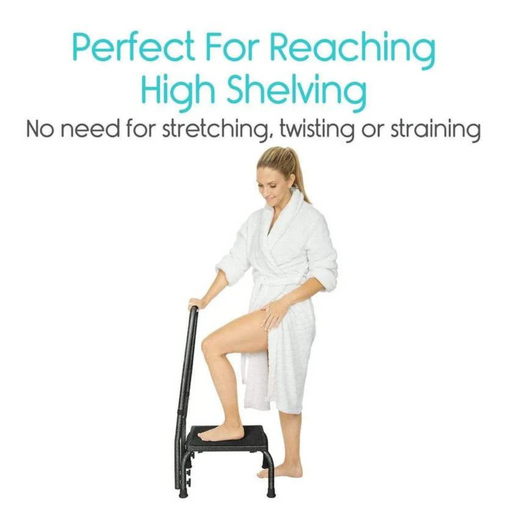 A person in a robe uses the Vive Health Step Stool—Heavy Duty Steel Frame—to easily reach high shelving. The non-slip platform ensures stability with no stretching, twisting, or straining needed.