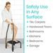 In a tiled room, a woman in a robe stands with one foot on the Vive Health Step Stool, featuring a non-slip platform for safe use on tile, carpets, hardwood floors and in bathrooms, kitchens, bedrooms, and garages.