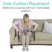 A woman demonstrates the Vive Health Couch Stand Assist for help with standing from a beige sofa with non-removable cushions. She wears a pink cardigan and beige pants. Text reads: Over Cushion Placement - Perfect for couches with non-removable cushions.