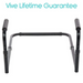 Against a white backdrop, a black adjustable aluminum frame toilet safety rail with padded handles and tool-free assembly is displayed. The blue text Vive Lifetime Guarantee assures independent transfer support for additional safety.