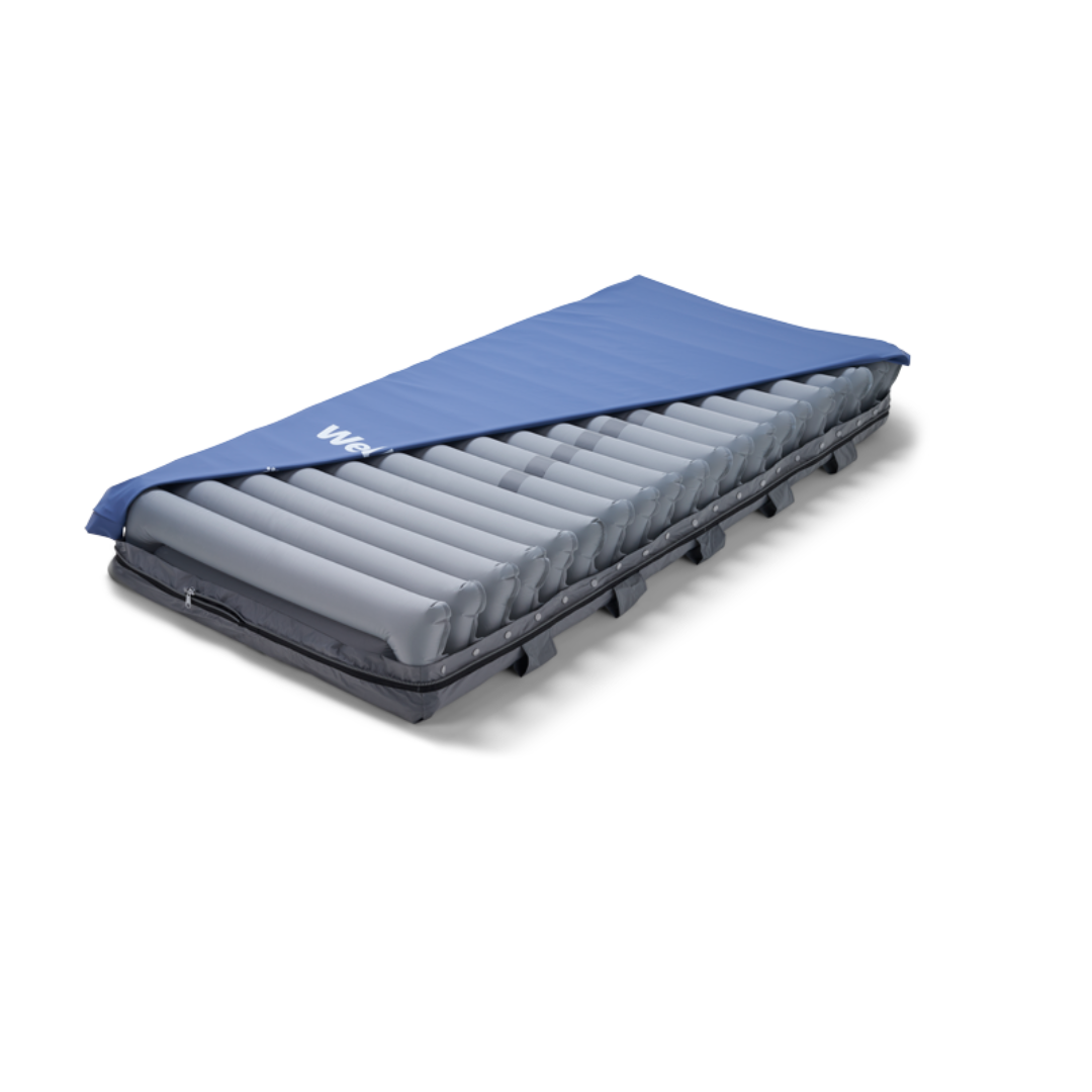 The Wellell Domus 3 Bariatric Alternating Pressure Mattress with Micro Low Air Loss features long, gray air cells and a blue cover for pressure ulcer prevention—ideal for long-term care, as shown on a white background.