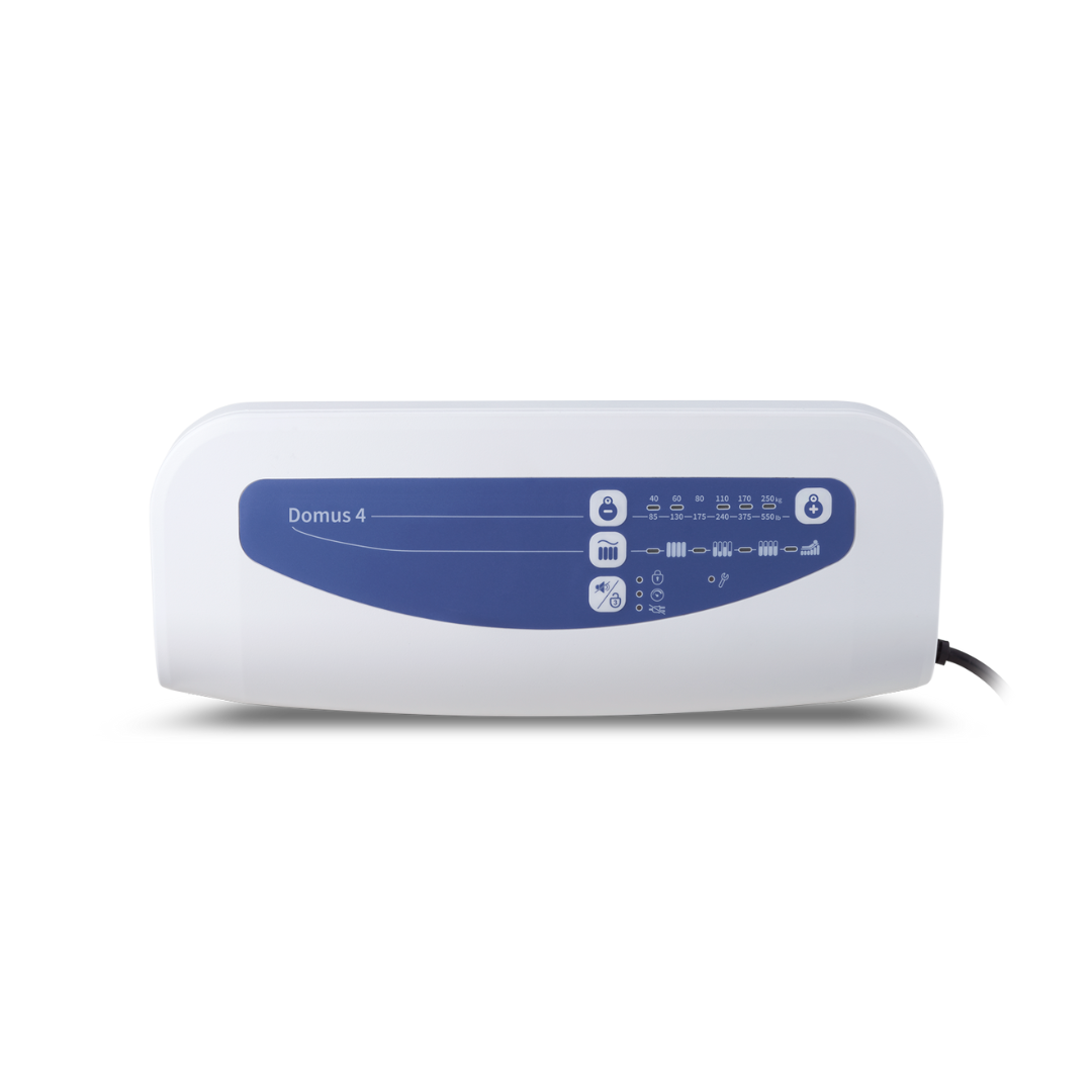 The Wellell Domus 4 Bariatric Alternating Pressure Mattress with Micro Low Air Loss is a white and blue rectangular device for pressure ulcer prevention, featuring a control panel with buttons and indicator icons, plus a right-side power cord.
