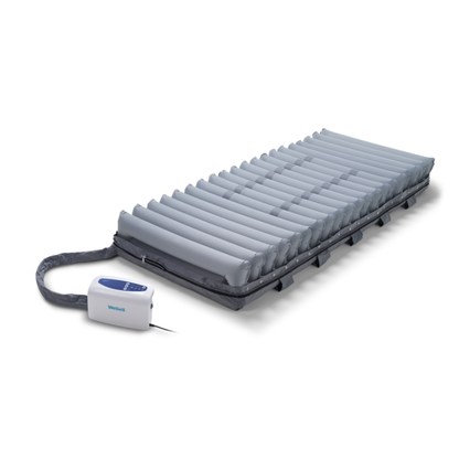The Wellell Domus 4 Bariatric Alternating Pressure Mattress with Micro Low Air Loss features multiple inflatable air tubes and an electric pump for pressure ulcer prevention and enhanced comfort, making it ideal for post-acute care.